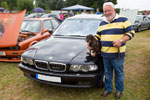 Uwe ('guhms') mit seinem BMW 750i (E38) Individual und Hund