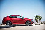 BMW X6 M50d in Flamenco Red