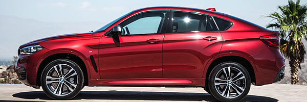 BMW X6 M50d in Flamenco Red