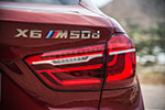 BMW X6 M50d in Flamenco Red