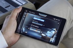 BMW 750Li, herausnehmbares Mutlifunktions-Bedieneinheit BMW Touch Command, Bedienung Sitzheizung und Sitzbelftung
