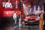 Bruno Spengler, BMW DTM-Fahrer, und Marcus Nilsson, Executive Producer von Ghost Games (v.l.n.r.). Weltpremiere des neuen BMW M5 in Need for Speed.