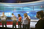 TV-Bild von den Teilnehmern im RTL-Nachrichtenstudio