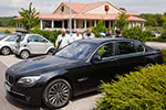 BMW 750Li (F02) auf dem Stammtisch-Parkplatz vor dem Café del Sol