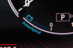 BMW ActiveHybrid 7: ActiveHybrid-Symbol in der Verbrauchsanzeige deutet auf Ladung der Batterie bzw. eBoost hin