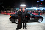 Berlinale 2011: Andreas Pietschmann und Jasmin Tabatabai vor BMW 7er.