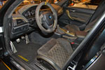 Essen Motor Show 2013: Manhart MH1 400 auf Basis BMW M 135i: Interieur ebenfalls mit gelben Akzenten
