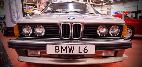 BMW L6, angeboten in den USA und Kanada mit niederverdichtetem Motor und Kat