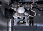 Weiterentwickelter BMW TwinPower Turbo 3-Zylinder Benzinmotor.