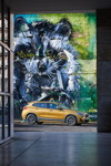 BMW X2 xDrive20d, Modell M Sport X, in Galvanic Gold, on location in Lissabon.