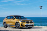 BMW X2 xDrive20d, Modell M Sport X, in Galvanic Gold, on location in Lissabon.
