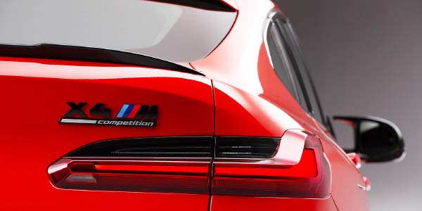Der neue BMW X4 M Competition. Rckleuchten im 3D-Design, Typ-Bezeichnung auf der Heckklappe, M-spezifischer Rckspiegel.