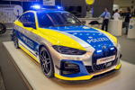 BMW i4 Polizeiauto by AC Schnitzer auf der Essen Motor Show, mit AC Schnitzer Frontspoiler-Elementen, rontsplitte und F ront Side Wings
